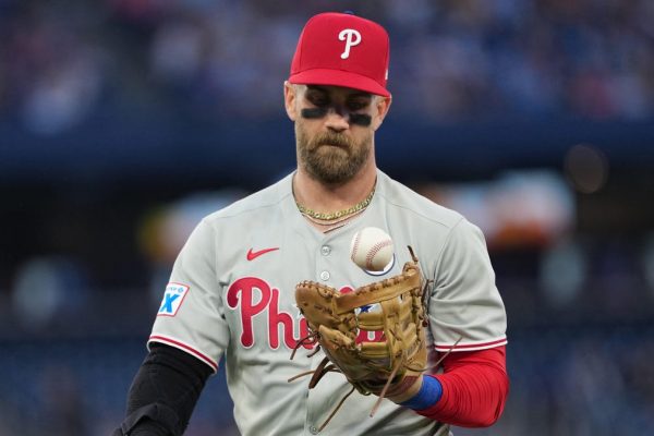 Phillies sink in NL East standings, Harper injury