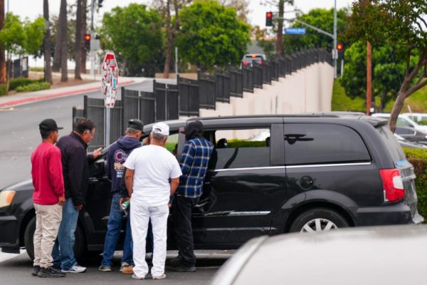 Amid chaos, undocumented L.A. workers toil on